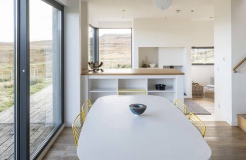 Skinidin House | Architect designed eco house with stunning loch and Mountain Views