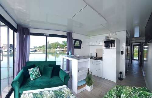 Mielno Boat Rental | Arka 2 domki na wodzie z rowerem wodnym centrum Mielno