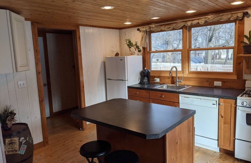 Arnolds Park Cabin | Arnolds Park Cabin with kayaks, bikes, and golf cart