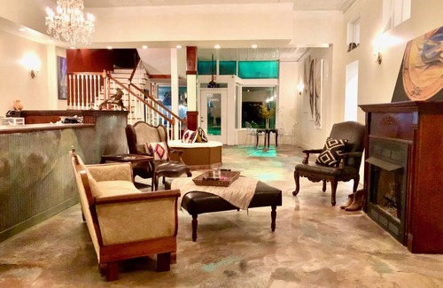 Cowan House | Artsy pet-friendly king room/historic railroad inn