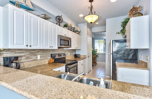 Naples Apartment | Asiago Vacation Rental at Lely Resort. Newly Furnished 2-Bedroom Condo with Stunning Lake & Golf Views. Spacious Retreat with Private Lanai, Resort Pool, Hot Tub and Gym Access
