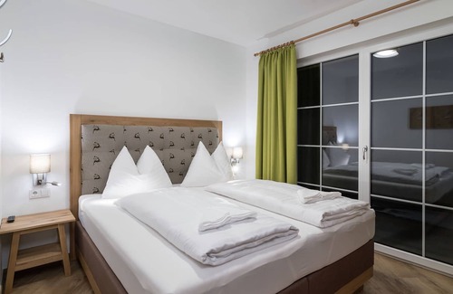 Alpendorf Ski Chalet | Apartment in St. Johann im Pongau with sauna