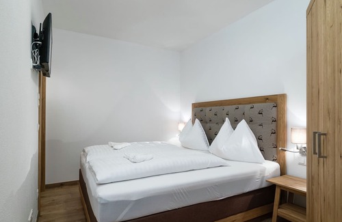 Alpendorf Ski Chalet | Apartment in St. Johann im Pongau with sauna