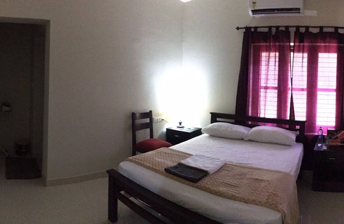 Nedumangad House | Athrakkattu Enclave 1 Bedroom Deluxe Suite