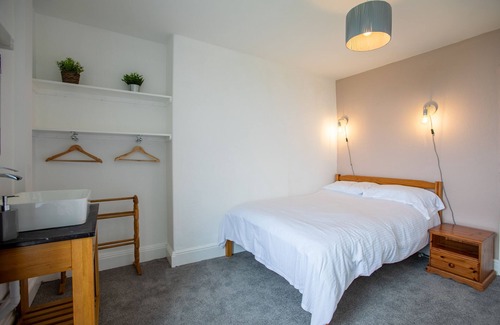 Widemouth Bay Cottage | ATLANTIC COURT, pet friendly, with a garden in Widemouth Bay