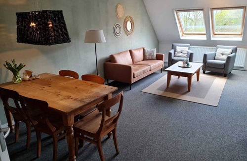 Sneek Apartment | Attractive apartment with bedroom in completely converted farmhouse