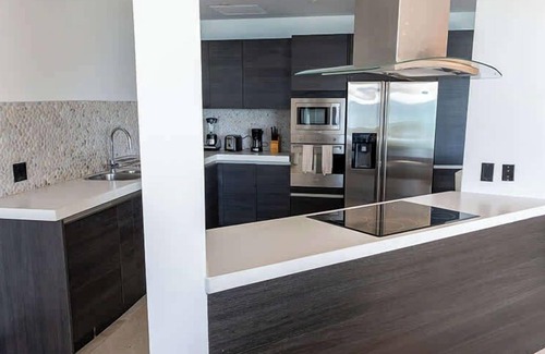 Fryes Beach Villa | Authentic two bedroom apartment with balcony and attractive ocean views