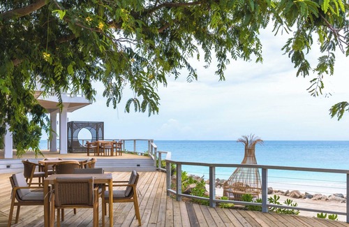Fryes Beach Villa | Authentic two bedroom apartment with balcony and attractive ocean views