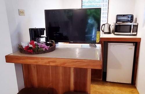 West End Cottage | Bak A Yaad Sapphire Blue Cottage