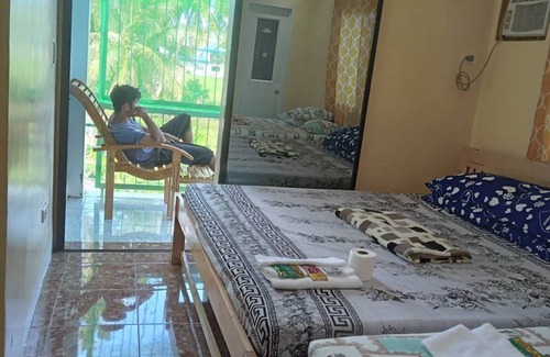 Guindulman House | Balai Mariacaria Pension House