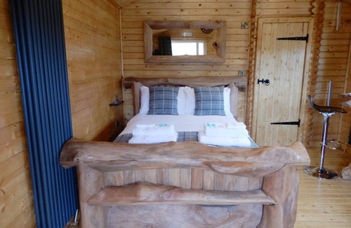 Welsh Frankton Cabin | Balmoral Studio Lodge 2 Birth Log Cabin With Lake Views & Private Hot Tub