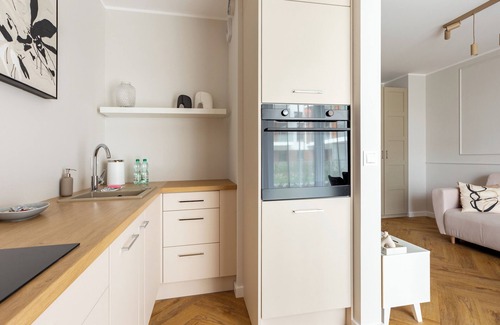 Siedlce Apartment | Baltic White Pearl Studio with Garden