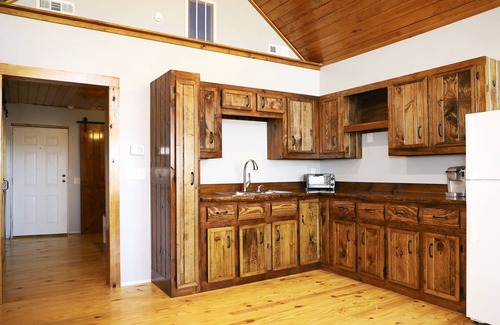Big Creek House | Barn Loft Apt 2 with Lake & Mountain views & custom wood accents through out.