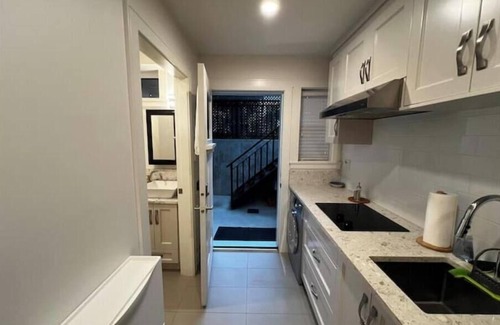 Arbutus Ridge Apartment | Basement Studio with Queen Bed