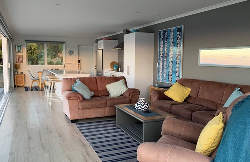 Tairua House | Beach and ocean views in every room.