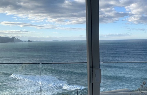 Tairua House | Beach and ocean views in every room.