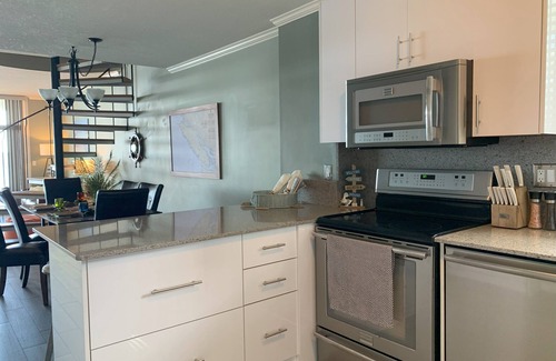 North Oyster Condo | Beach Bliss oceanfront king suite! View, pool, hot tub & dock. Great Fall rates