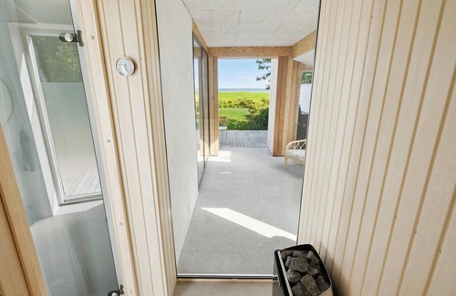 Hov House | Beach front home in Tranekær with sauna