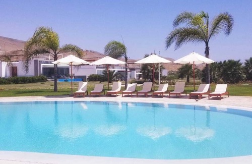 Asia House | Beach House Condominium Playa Coral 4 km before the boulebard of Asia