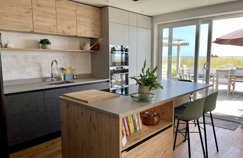 Southwick House | Beach House with huge deck & hot tub leading directly onto Shoreham Beach