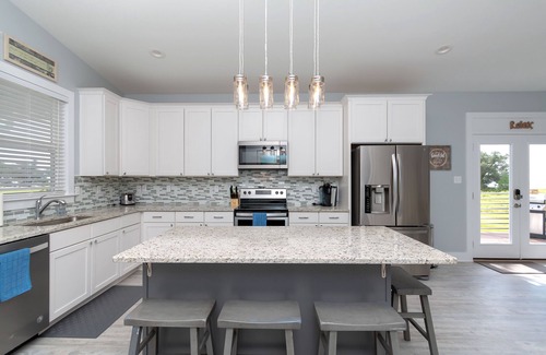 Mississippi City House | Beach house with gorgeous views, private green space, and steps to the beach.