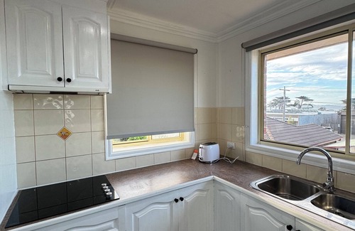 San Remo House | Beach house with water view. Walking distance to amenities . Walk to the beach.