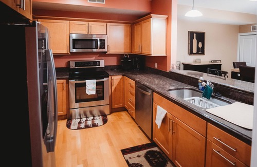 Geneva-on-the-Lake Condo | BEACH LEVEL CONDO L08 -2 BR/2 BA Walk right out to the Private Beach!