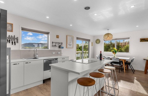 Mangawhai Heads House | Beach Time - Modern, sunny home close to amenities, a great place to relax and watch the kids play