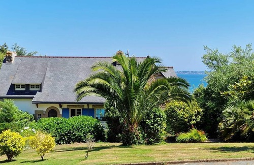 Lanmodez House | Beach view villa at the end of the garden covered swimming pool heated all year round