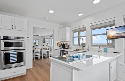 Pointe San Luis House | Beachfront | 5 bedroom | Hot Tub | Fenced Yard