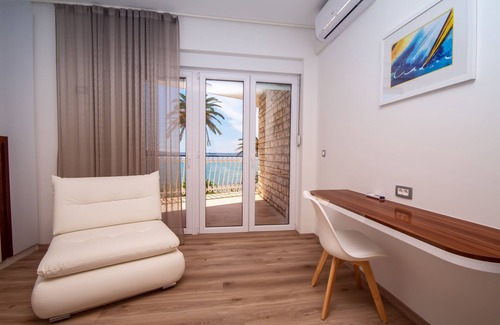 Podstrana Villa | Beachfront Bliss: Villa Amor - A Luxurious 7 bedroom villa with a heated pool
