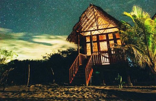 Poneloya House | Beachfront bungalow: sea, garden and mountain views