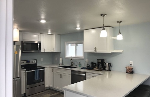 North Douglas House | Beachfront community with city and mountain view.
