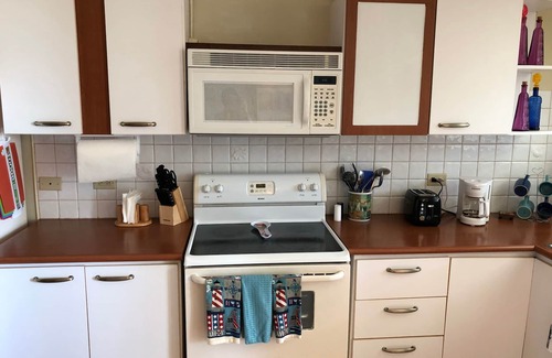 Miradero Condo | Beachfront family friendly garden condo, full A/C, WiFi, sleeps 6, Smart TV's