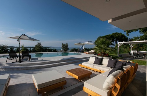 Vourvourou Villa | Beachfront villa in Vourvourou, Halkidiki with private pool, ideal for families.