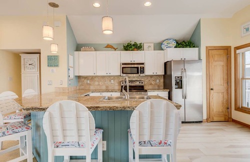 Buck Island House | Beachin Fun (North Unit) | 1665 ft to the beach | Hot Tub, Dog Friendly, and Community Pool