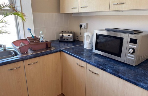 Pendine Apartment | Beachside Apartment with Stunning Sea Views (only a few steps from the beach!)