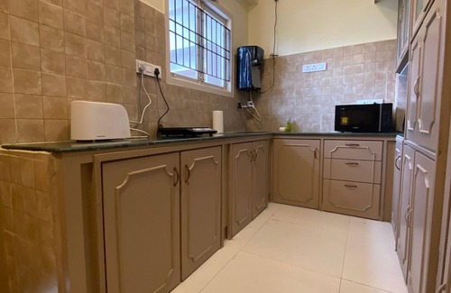 Visakhapatnam Apartment | Beachside Getaway:Fully furnished 2BHK, Modern Amenities, WiFi, 200m to sea