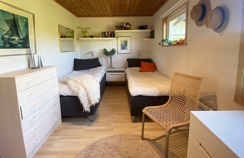 Lervik House | Beachside holiday home with large lovely garden | SE01054