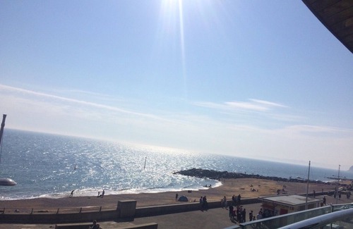 West Bay Apartment | Beachside, stunning apartment with sea and harbour views