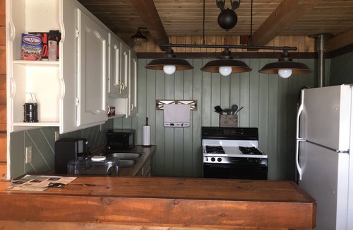 Dolores Cabin | Bear Bait Cabin is cozy and rustic overlooking beautiful aspen trees