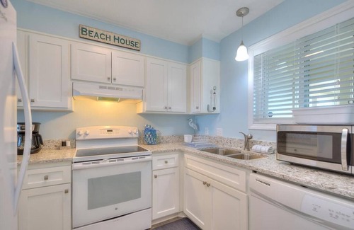 Caswell Beach Condo | Beautiful 2BR/2BA Oceanfront Condo-Beach Steps Away, Pool, Sleeps 5