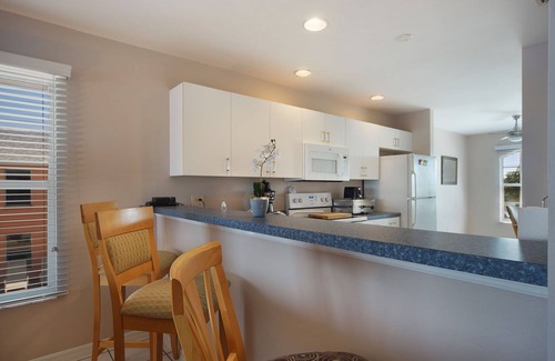 Pelican Apartment | Beautiful 4 unit building on Lake Louise with a private pool.