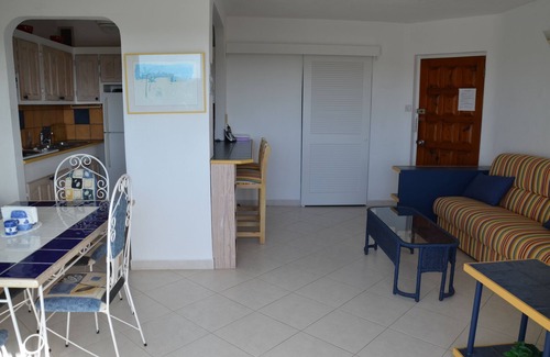 Halcyon Heights Apartment | Beautiful 4th.floor condo with pool and spectacular sunsets and ocean view