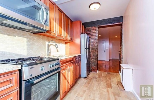Concourse Apartment | Beautiful an spacious two bedroom complete apartment with deck and patio.
