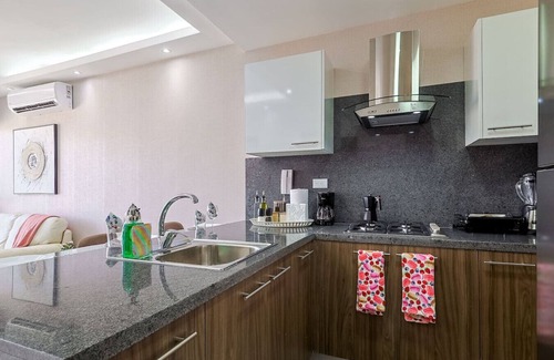 Evaristo Morales Apartment | Beautiful and Cozy 1BR Centric Condo, Full AC, King Bed, Pool.