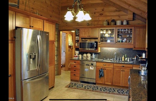 Brant Lake House | Beautiful Brant Lake home with direct lakefront, hot tub and snowmobile access!
