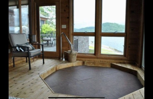 Brant Lake House | Beautiful Brant Lake home with direct lakefront, hot tub and snowmobile access!