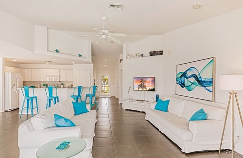 Trafalgar House | Beautiful Cape Coral Home, Outdoor Oasis with Heated Pool on a Freshwater Canal!