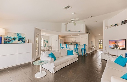 Trafalgar House | Beautiful Cape Coral Home, Outdoor Oasis with Heated Pool on a Freshwater Canal!
